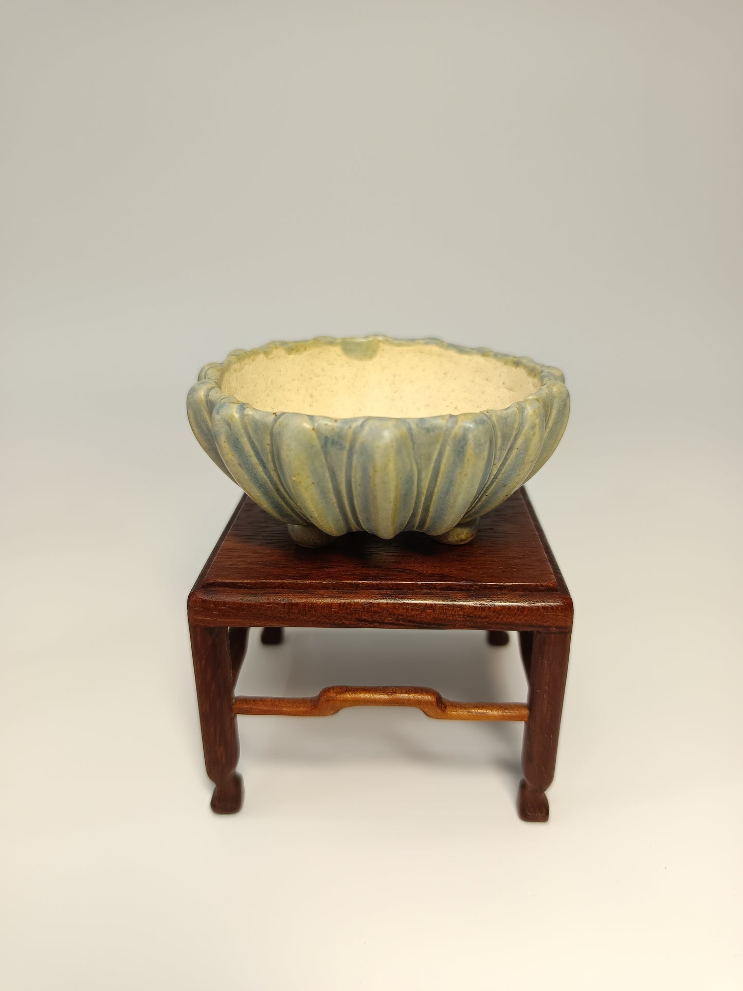 Juego mesas de iroko ·Macetas gres