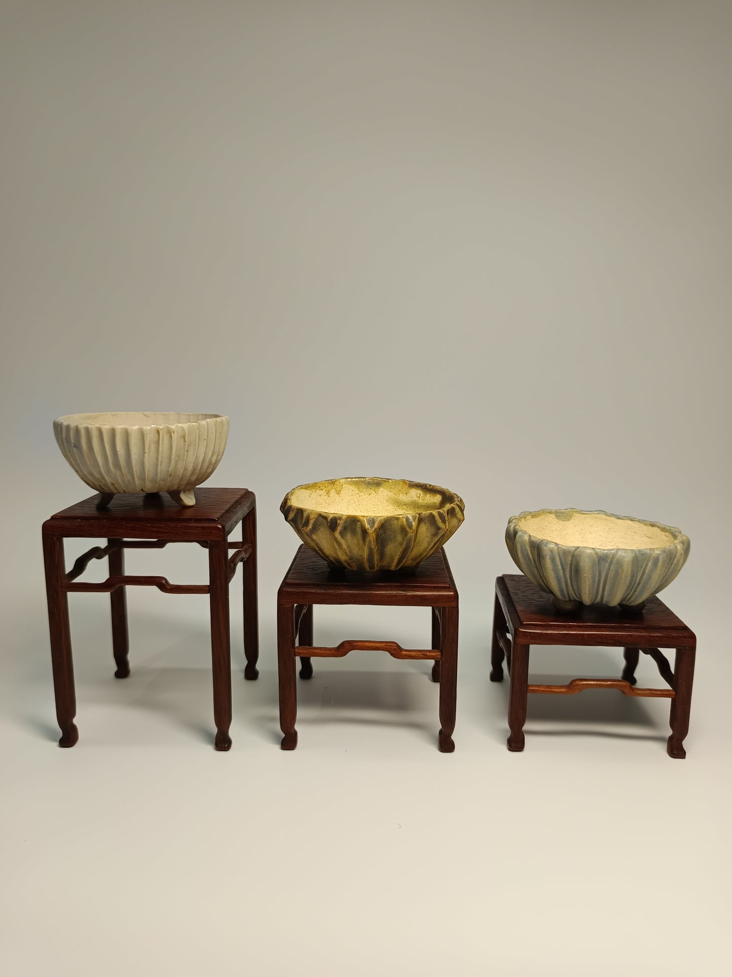 Juego mesas de iroko ·Macetas gres